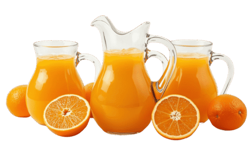 A clear glass pitcher filled with orange juice, surrounded by whole and halved fresh oranges on a solid teal background.