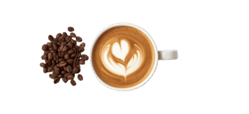 Top view of a latte coffee cup with heart-shaped latte art, placed beside a pile of roasted coffee beans on a plain background.