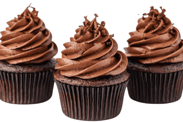 Two chocolate cupcakes with swirled chocolate frosting on transparent background