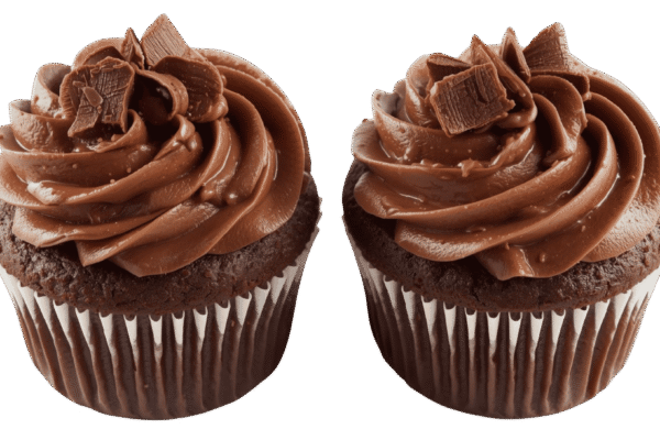 Two chocolate cupcakes with swirled chocolate frosting on transparent background